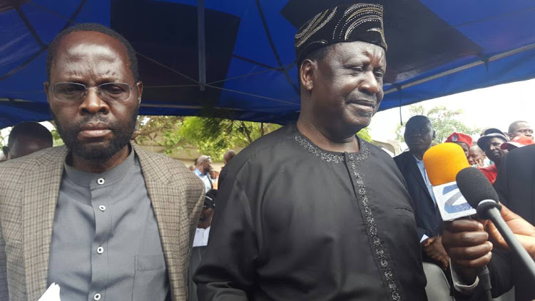 Lupita Nyong'o's father, Peter, next to Kenyan opposition leader Raila Odinga.