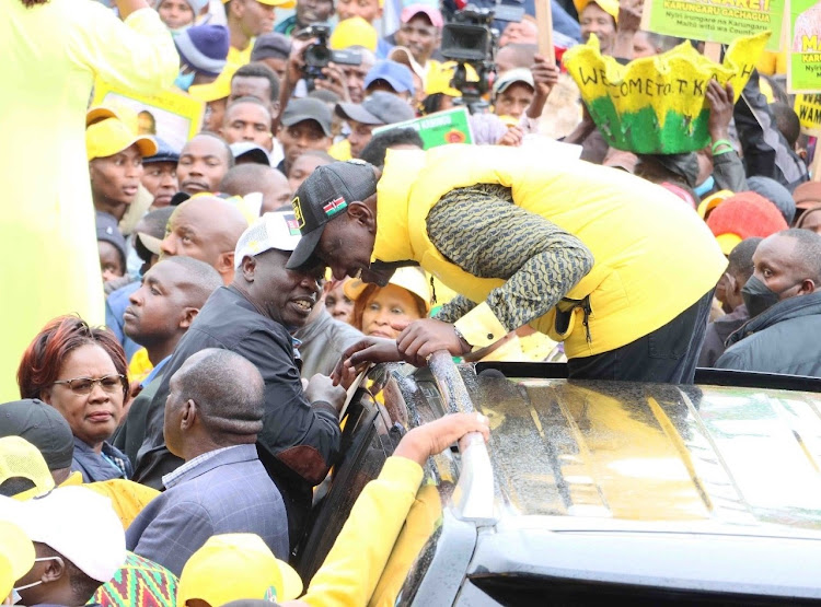 Deputy President William Ruto has a word with Mathira MP Rigathi Gahagua during his visit to Nyeri on Saturday