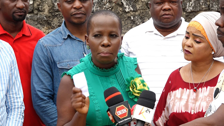 UDA's Juliet Riziki with Mwanahamisi Bakari and other UDA leaders during the press conference in Kilifi town on Tuesday