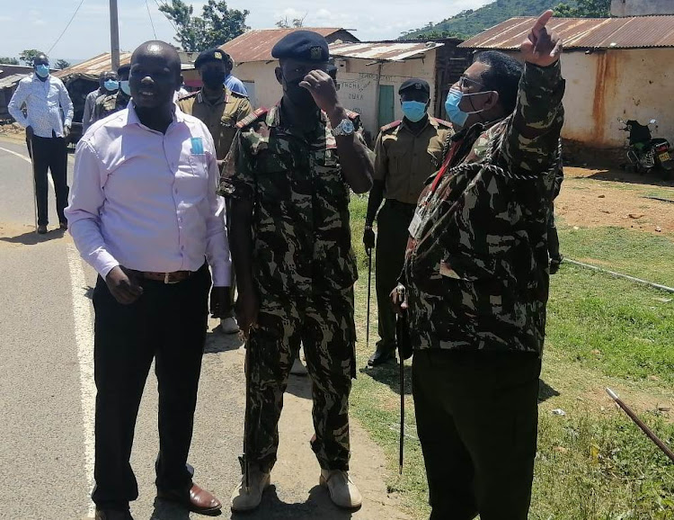 Security bosses led by Elegyo Marakwet county commissioner Dr Omar Ahmed (R) during a tour of the Kerio Valley region.