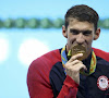 Michael Phelps pose avec ses 28 médailles olympiques