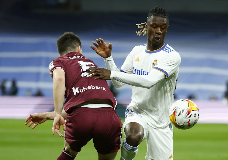 Real Madrid's Eduardo Camavinga in action with Real Sociedad's Igor Zubeldia