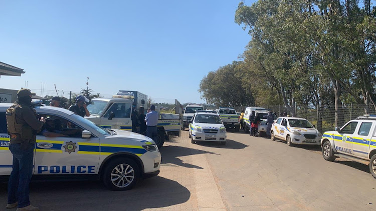 Police and members of the animal anti cruelty league descend on on the Fairview Racecourse this morning after reports that at least one horse had been killed alleged by a group of protestors.