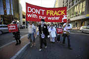 Protesters march against Shell's Karoo fracking plans. The government has decided to go ahead with shale-gas exploitation.