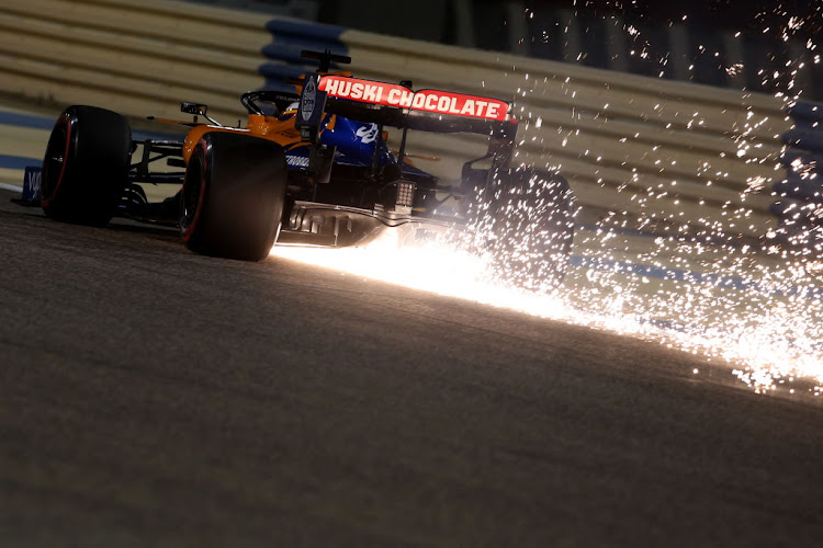 Sparks fly behind Carlos Sainz of Spain driving the (55) McLaren F1 Team MCL34 Renault on track during the F1 Grand Prix of Bahrain at Bahrain International Circuit on March 31, 2019 in Bahrain, Bahrain.