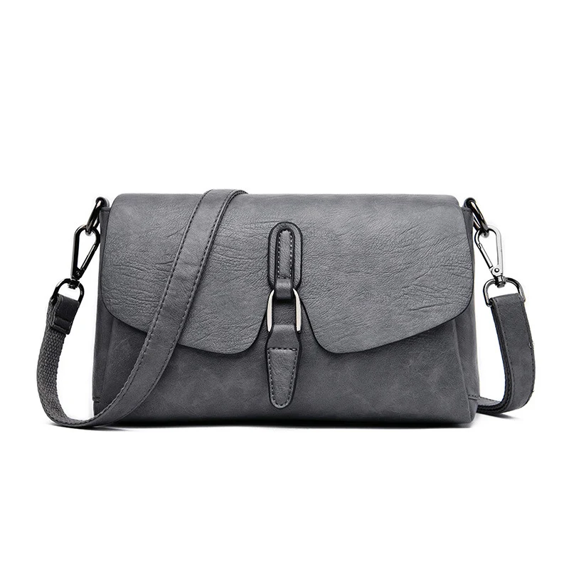 Sac bandoulière rétro pour femmes, polyvalent et s'accordant à toutes les tenues. Idéal pour transporter vos essentiels quotidiens avec style et confort.