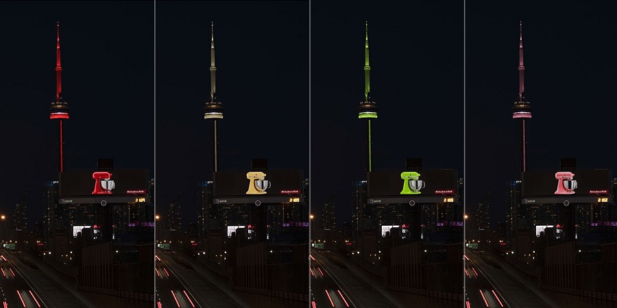 An image of the CN tower and KitchenAid mixer, both lit up the same colors.