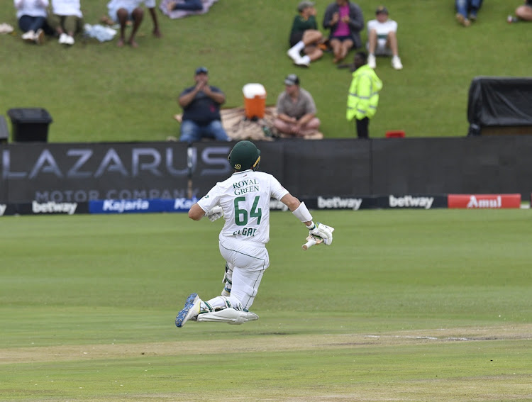 Dean Elgar of South Africa celebrates his century in the first Test against India at SuperSport Park in Centurion on Wednesday.