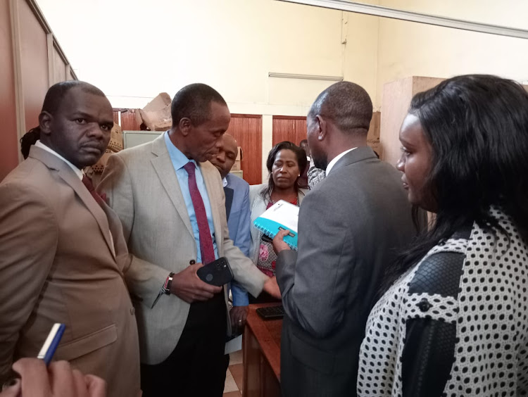 Kiambu Governor Kimani Wamatangi during his familiarisation tour in Thika offices .