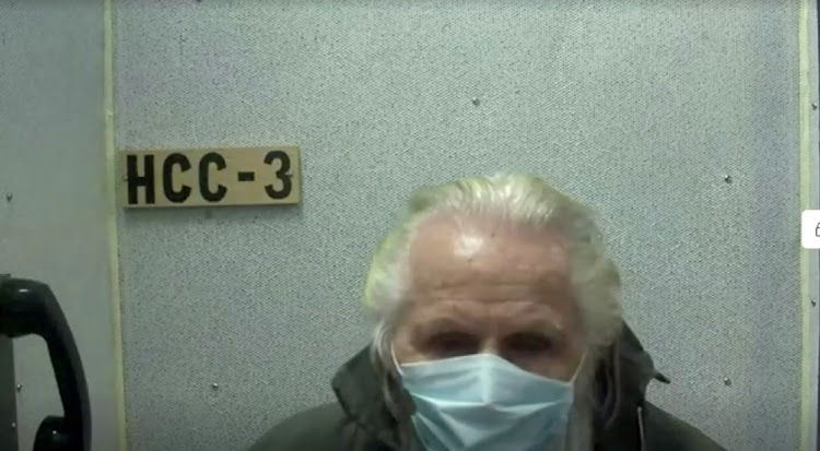 A screen grab shows Canadian fashion designer Peter Nygard speaking from jail, via video link, during his extradition hearing in Winnipeg, Manitoba, Canada on October 1, 2021.