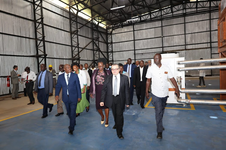 Agriculture Principal Secretary Paul Ronoh (front, left) and leaders during the commissioning of the industrial mycotoxin plant at the Bungoma NCPB on February 1, 2024.