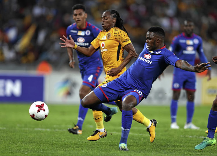 SuperSport United defender Morgan Gould (in blue) clears the ball from Siphiwe Tshabalala of Kaizer Chiefs during the cup quarterfinals in Durban yesterdayPicture: Gallo Images