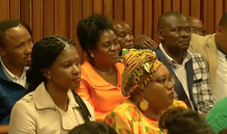 Nigerian pastor Timothy Omotoso’s wife, Taiwo Omotoso, in the orange outfit, was reprimanded by Judge Mandela Makaula in the Port Elizabeth High Court on October 16 2018.