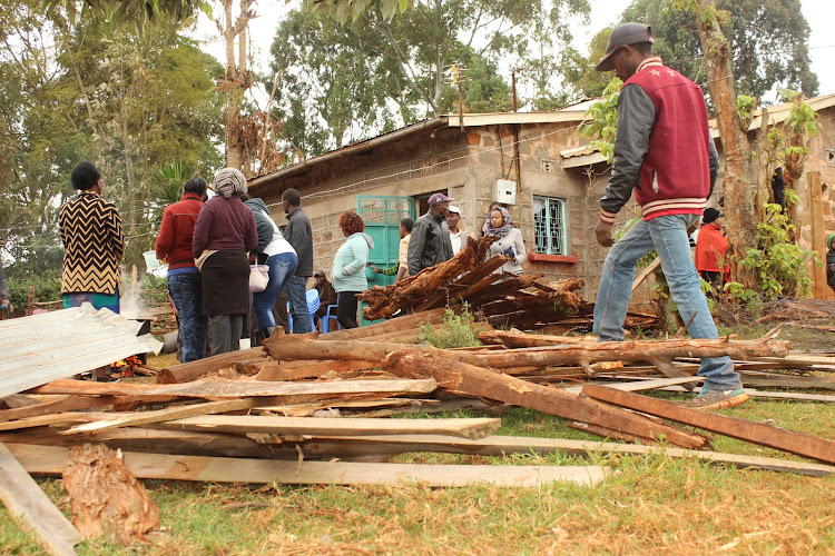 Ngangarithi area residents at the scene where attackers raided a homestead and destroyed property on Wednesday.