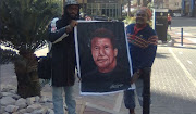 Rasta's painting of Arnold Schwarzenegger.