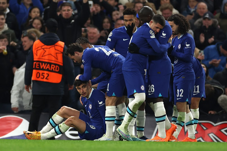 Kai Havertz of Chelsea celebrates scoring a penalty to make the score 2-0 with his teammates in the Uefa Champions League last 16 second leg match against Borussia Dortmund at Stamford Bridge on March 7 2023.