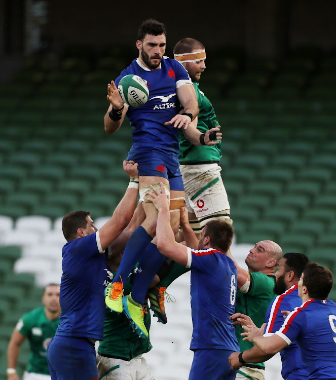 France's Charles Ollivon and Ireland's Iain Henderson contest a lineout