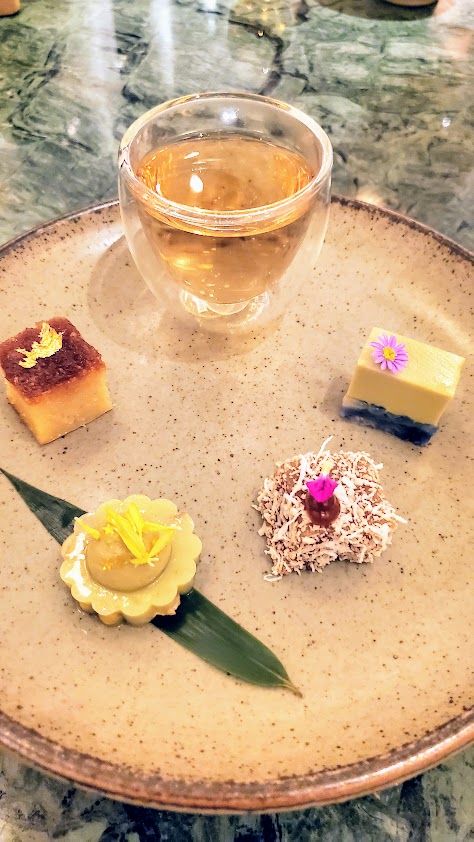 Homemade Traditional Nyonya Kuehs an Sweets with Bunga Telang Tea as part of an Ahma-kase Dinner at Candlenut for Peranakan Food