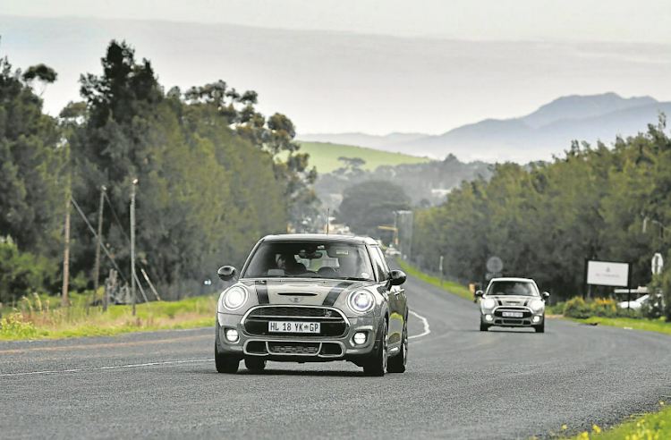 The Convertible has also been updated and is even available with a Union Jack folding roof. Even with the swell in size, the three-door and five-door variants of the Mini Cooper still offer those corner-hugging antics of their predecessors. Mini SA has given its three-door, five-door and convertible versions a nip and tuck.