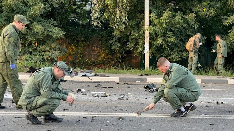 Russian investigators released this photo of teams inspecting the site of the explosion