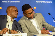 SuperSport chief executive Gideon Khobane (R) and his counterpart at MultiChoice Calvo Mawela address the media to announce the outcome of the independent review into the Ashwin Willemse ‘walking out during live broadcast saga’ on June 19, 2018 in Randburg, South Africa. 