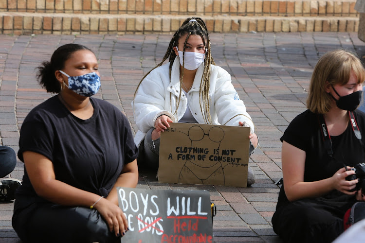 Some of the more than 200 participants in the sit-down protest at the Port Elizabeth City Hall against gender-based violence on Saturday.