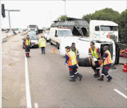 EMERGENCY: Seventeen people were injured, three critically, when the minibus taxi they were travelling in overturned on the M4 Southern
Freeway's Durban-bound carriageway. © NETCARE 911.