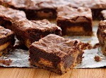 Peanut Butter Cup Cookie Dough Brownies was pinched from <a href="http://www.pillsbury.com/recipes/peanut-butter-cup-cookie-dough-brownies/7cfdfcb1-8c46-4732-afe6-cc988a0ea518" target="_blank">www.pillsbury.com.</a>