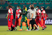 Senegal's Sadio Mane receives medical attention after sustaining an injury.