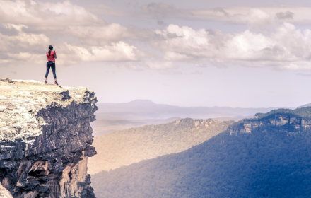 Girl standing on top small promo image