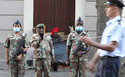 A homeless lady looks on during the final rehearsal preparations are underway for tomorrow’s State of the Nation Address at Cape Town City Hall. Pic: ESA ALEXANDER