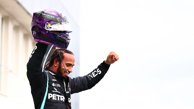 Race winner Lewis Hamilton of Great Britain and Mercedes GP celebrates in parc ferme during the Formula One Grand Prix of Hungary at Hungaroring on July 19, 2020 in Budapest, Hungary.