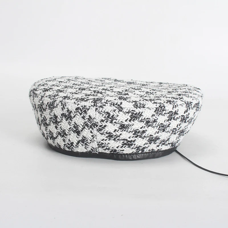 Kleine geur tweed baret met verstelbare leren randen
