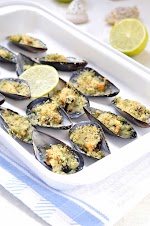 Mussels Gratin was pinched from <a href="http://12tomatoes.com/2014/10/italian-seafood-appetizer-butter-garlic-mussel-gratin.html" target="_blank">12tomatoes.com.</a>