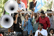 Writer and activist Arundhati Roy speaks to a gathering after a  march from Mandi House to parliament to demand the release of detained students  in New Delhi, India.  Roy's new novel, 'The Ministry of Utmost Happiness', reflects on her political views.