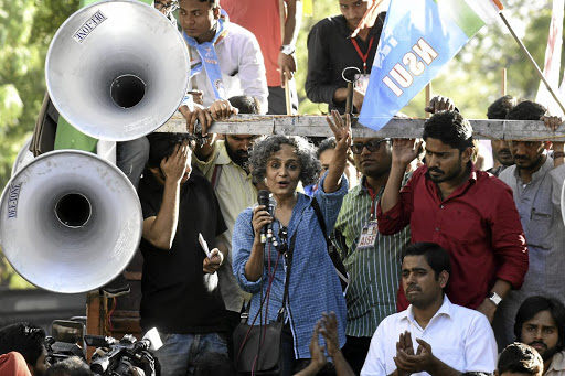 Writer and activist Arundhati Roy speaks to a gathering after a march from Mandi House to parliament to demand the release of detained students in New Delhi, India. Roy's new novel, 'The Ministry of Utmost Happiness', reflects on her political views.