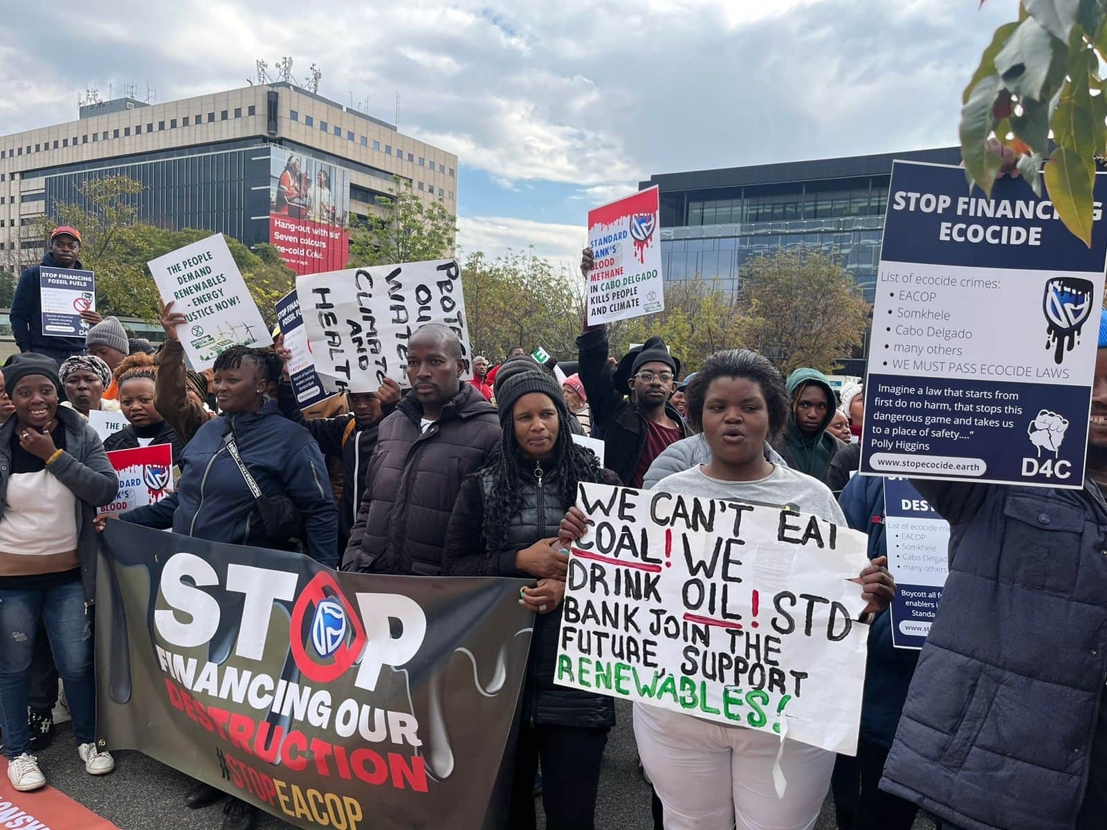 Rebels and other activists rally outside the Standard Bank AGM