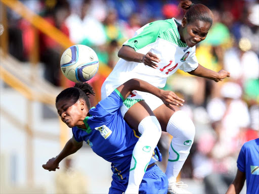 Kenya’s Mbeyu Esse Akida(RIGHT) and Tanzania’s Khamis Maimuna in aerial battle in a past encounter