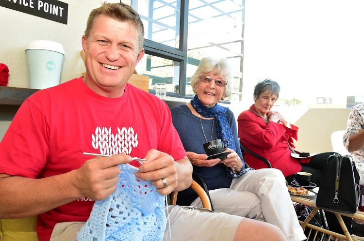 Rhenier Botha and Mary Emms produced the goods at the 67 Blankets for Nelson Mandela end- of-year high tea and knit-a-thon at Holiday Coffee shop in Walmer