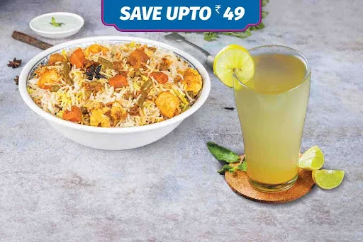 Veg Half Kg Biryani + Beverage Meals