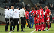 Highlands Parks head coach Owen Da Gama and his assistants chat to the players during a Absa Premiership match against Orlando Pirates at Orlando Stadium on August 4 2018.    