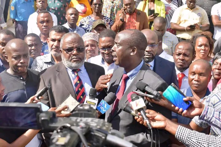 Mombasa Senator Mohammed Faki and Lawyer Danstan Omar address the media outside the Mombasa Law Courts building on Monday.