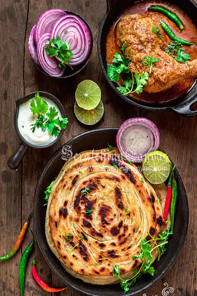 Tawa Chicken (500ml) + Chicken Briyani + 2 Laccha + Raita