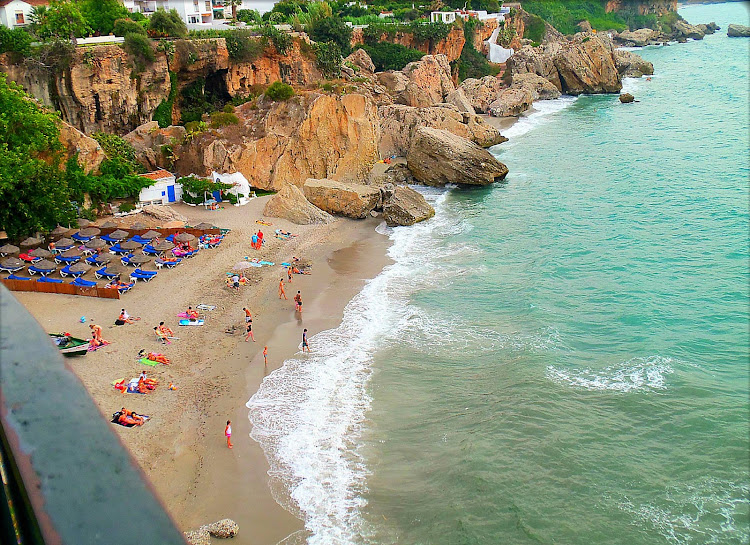 Nerja is a scenic beach near Málaga, Spain, on Costa del Sol.