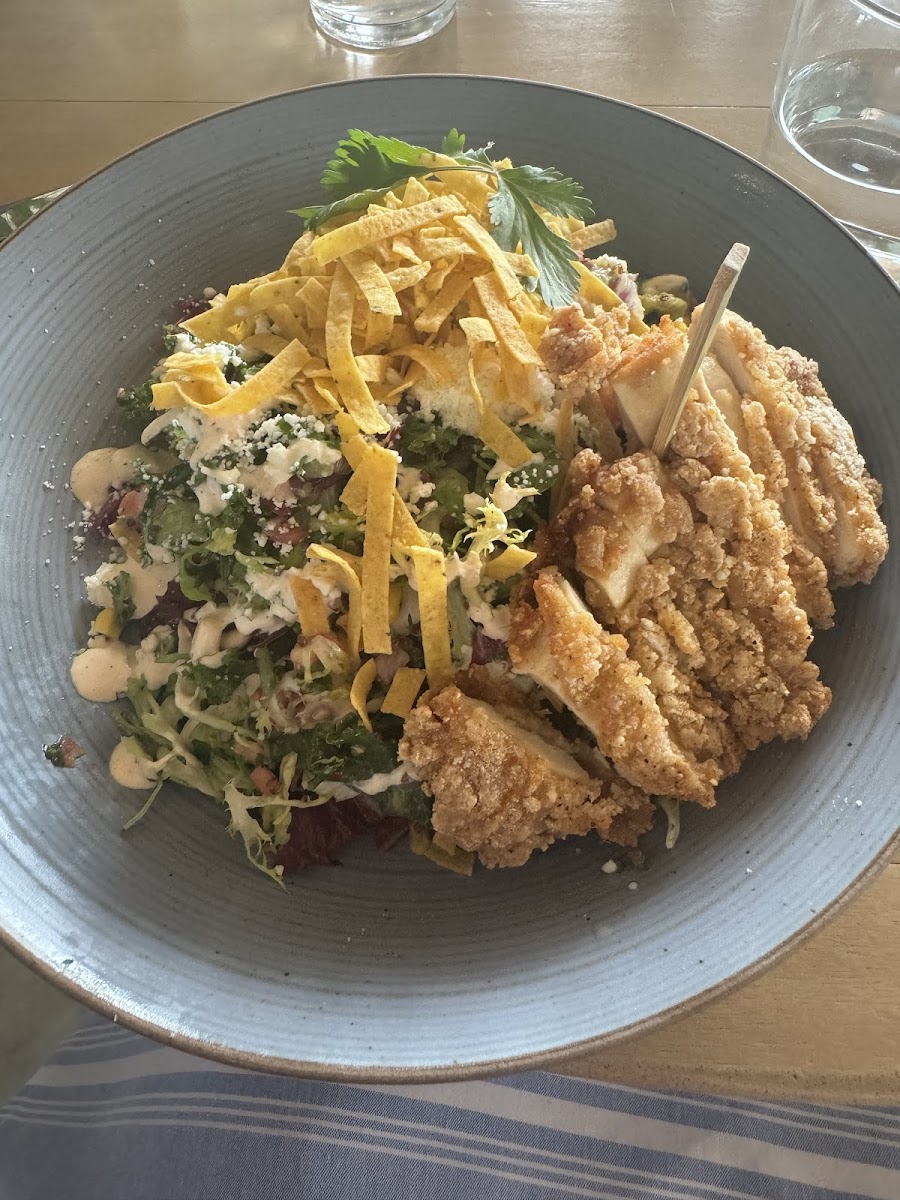 Costa Mesa salad with gluten free fried chicken - queso fresco, corn, pico de gallo, avocado, quinoa, crispy tortilla, chipotle crema, lime vinaigrette