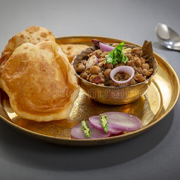 Punjabi Cholla Bhatura/Lassi