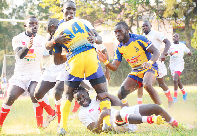 Homeboyz’s Jeff Oluoch and Mohammed Omollo in battle with Nondies' players during a past match
