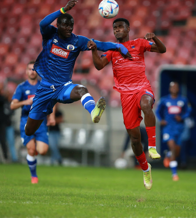 Mamour Niang of SuperSport United and Abdi Banda of Chippa United during the DStv Premiership match between Chippa United and SuperSport United at Nelson Mandela Bay Stadium.