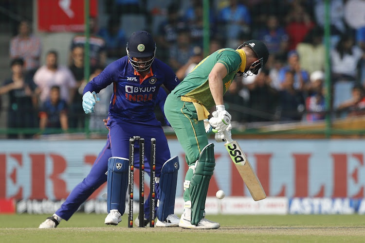 SA captain David Miller is bowled by Washington Sundar of India in the third ODI at Arun Jaitley Stadium in Delhi, India on October 11 2022.