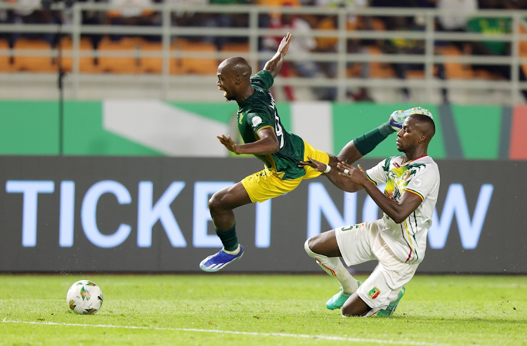 Bafana Bafana striker Evidence Makgopa is tackled by Boubacar Kouyate of Mali during their Africa Cup of Nations match at Amadou Gon Coulibaly Stadium in Korhogo on Tuesday